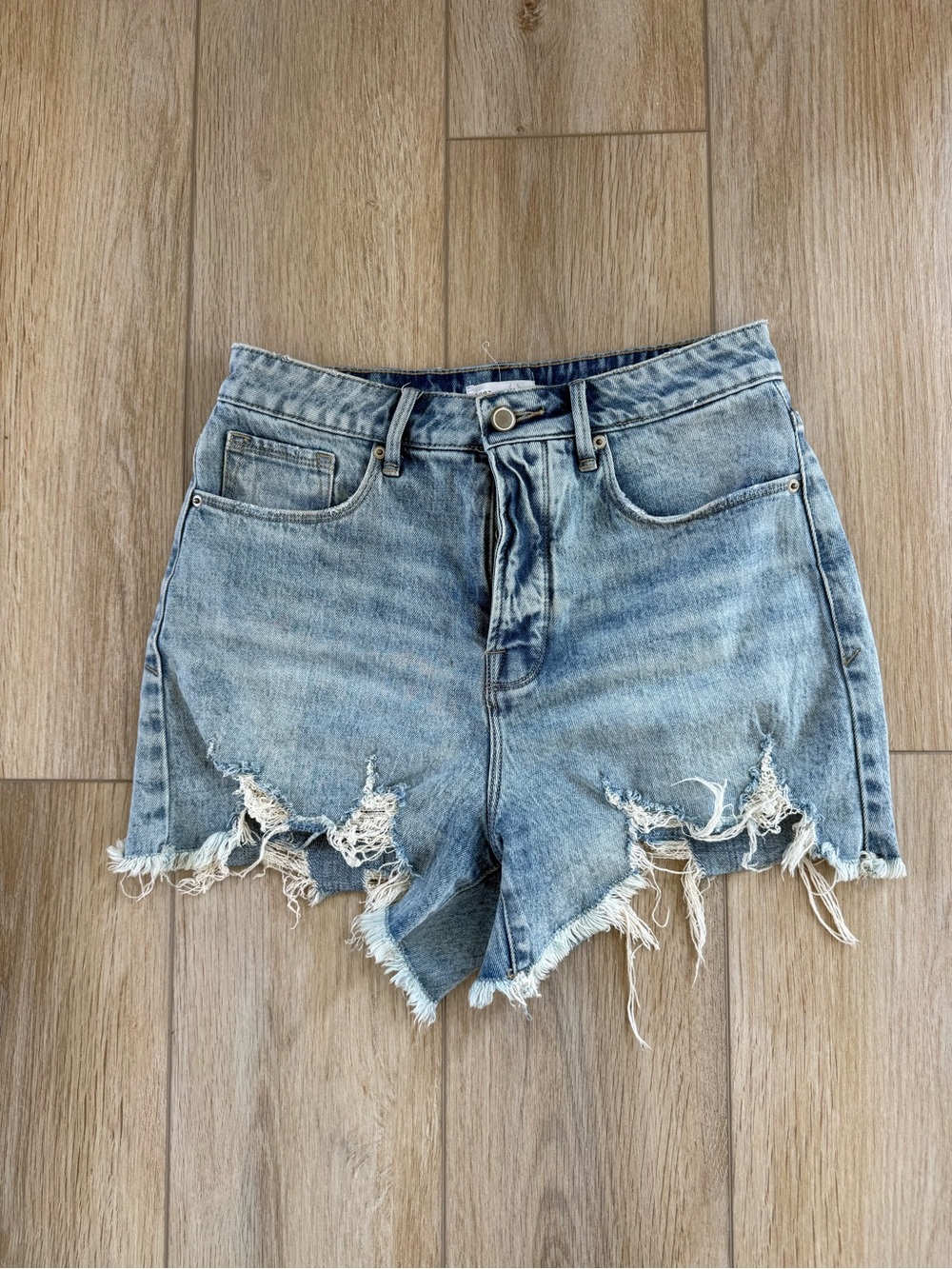 Good American Light Blue Distressed Denim Cutoff Shorts